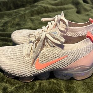 Nike Cream and Pink Athletic Shoes with Modern Design and Cushioned Sole
